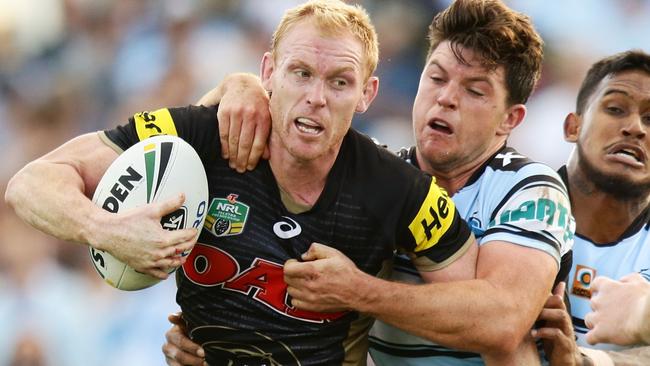 Penrith’s Peter Wallace struggled with an elbow injury against Cronulla.