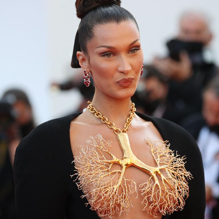 Bella Hadid Stuns With Incredible Gold-Dipped Lungs Look at Cannes Film  Festival 2021, 2021 Cannes Film Festival, Bella Hadid