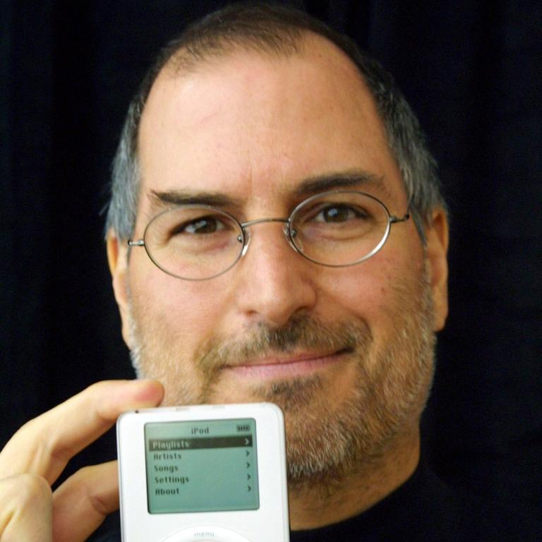 Former Apple CEO Steve Jobs with the original iPod. iTunes launched a few months ahead of the revolutionary device in 2001.