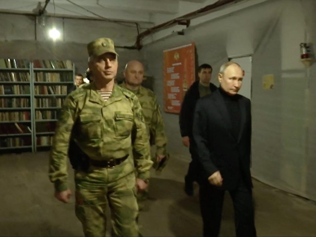 Vladimir Putin tours military facilities on the frontline. Picture: AFP