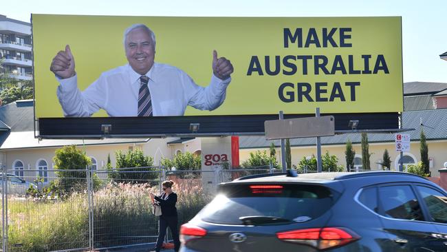 A billboard featuring Australian businessman and former politician, Clive Palmer is seen on Vulture Street in the Brisbane suburb of Woolloongabba. Picture: AAP Image/Darren England