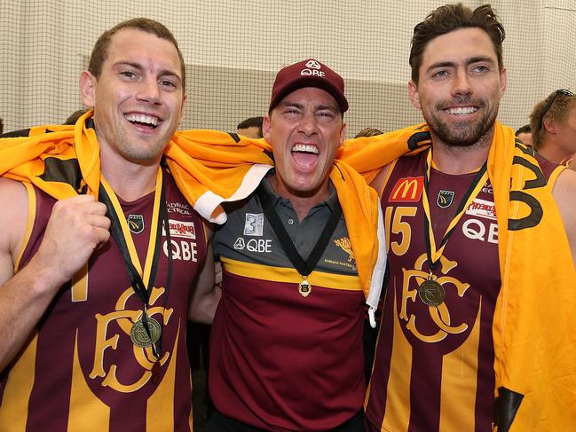 Chris Phelan celebrates last year’s WAFL premiership with captain Kyal Horsley and coach Jarrad Schofield. Picture: Paul Kane/Getty Images