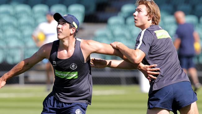 NAB CUP: Carlton training, Aurora Stadium, Launceston: No.1 draft pick Jacob Weitering pushes in front of team mate Harry McKay Picture: Luke Bowden