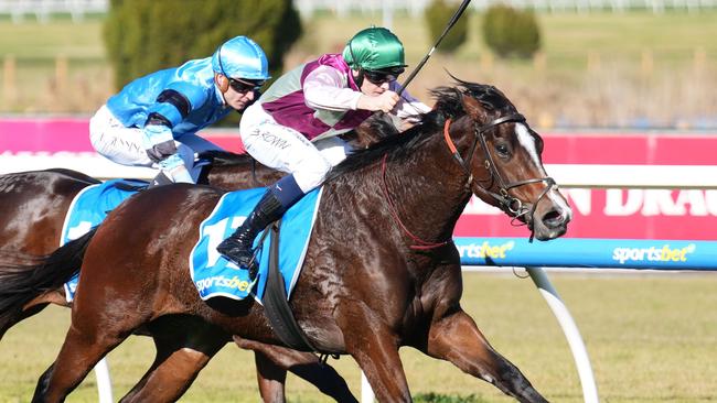 Ethan Brown riding Manolo Bling to victory on debut at Caulfield. Picture: Scott Barbour/Racing Photos via Getty Images