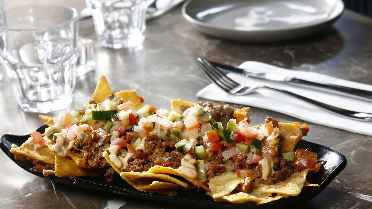 Accompany your cocktails with nachos at Valencia’s tapas. Picture: John Appleyard