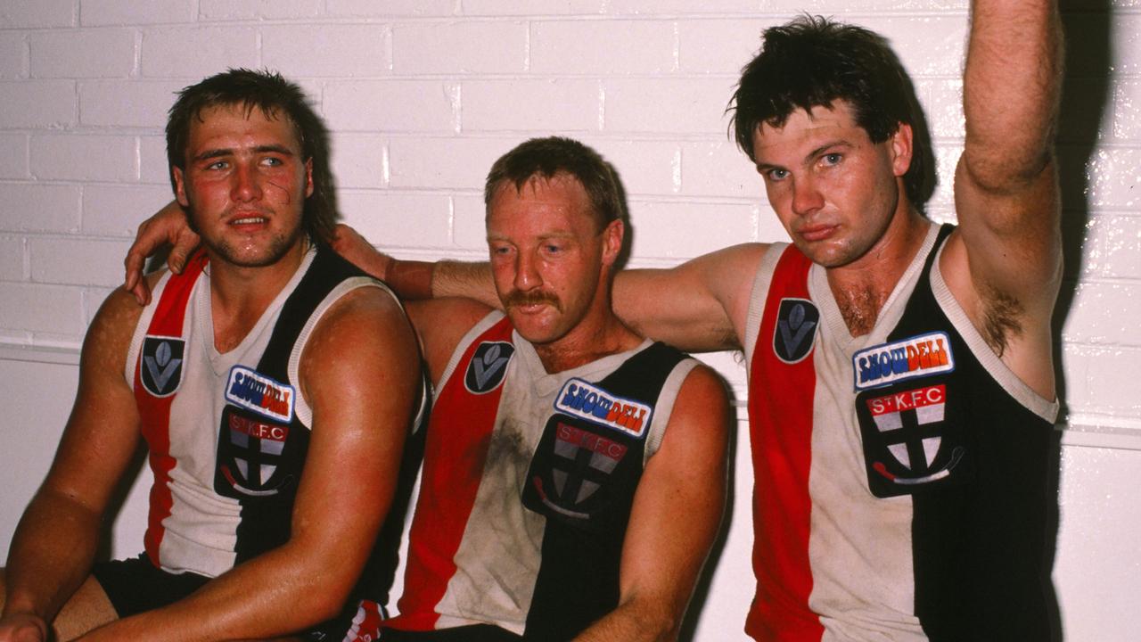 Tony Lockett, Geoff Cunningham and Danny Frawley after a St Kilda game in 1989.