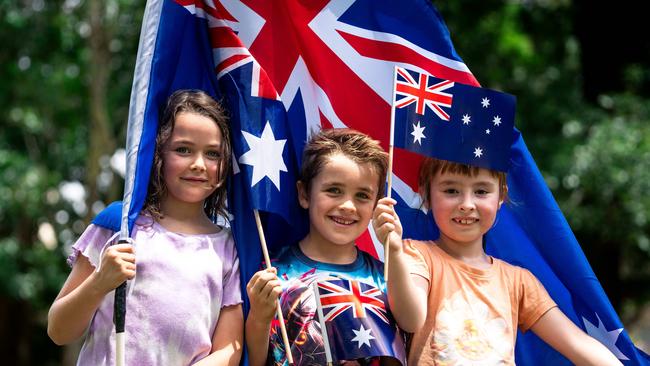 Summer Dunn, 7, Logan Delport, 6 and Emelia, 7 enjoy their Australia Day celebrations in Parramatta Park. Picture: Tom Parrish