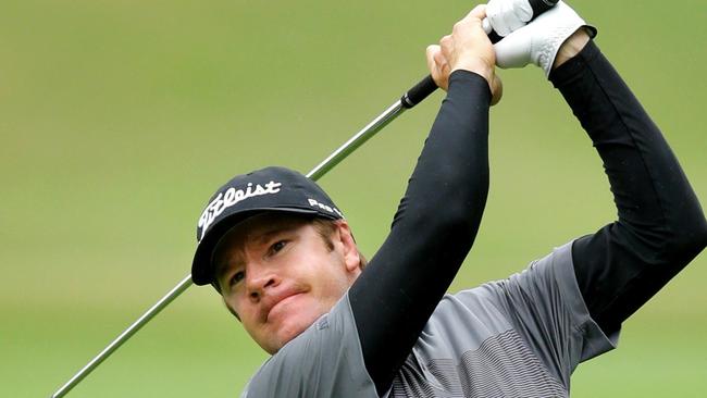 Aron Price hits his approach shot to the 1st green during round 1 of the Australian Open Golf Championship at The Australian Golf Club, Sydney. Picture Gregg Porteous