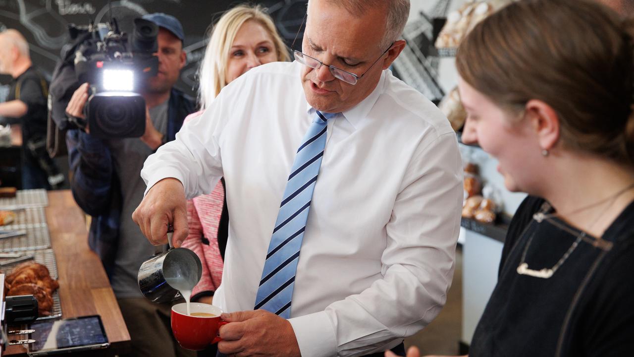 Mr Morrison pours his coffee at Baked by Keiran in Southerland, Sydney NSW. Picture: Jason Edwards