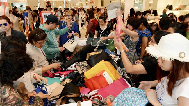 Like a lifetime ago: Shoppers root for bargains in the Boxing Day sales at David Jones. Picture: Jake Nowakowski.