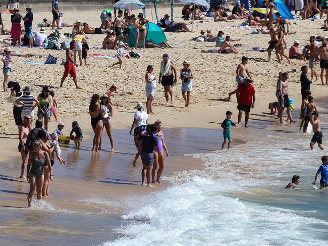 SYDNEY, AUSTRALIA - Newswire Photos DECEMBER 28, 2022: People are seen enjoying an early morning swim at Coogee Beach in Sydney. Picture: NCA Newswire / Gaye Gerard