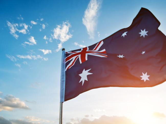 Waving Australia flag in the air.