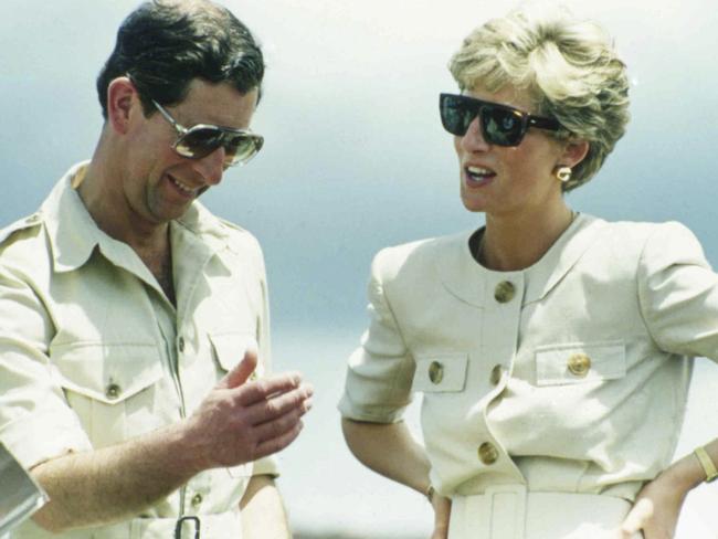 Prince Charles and Princess Diana during their visit to an iron ore mine near Carajas, Brazil in 1991. Picture: AP