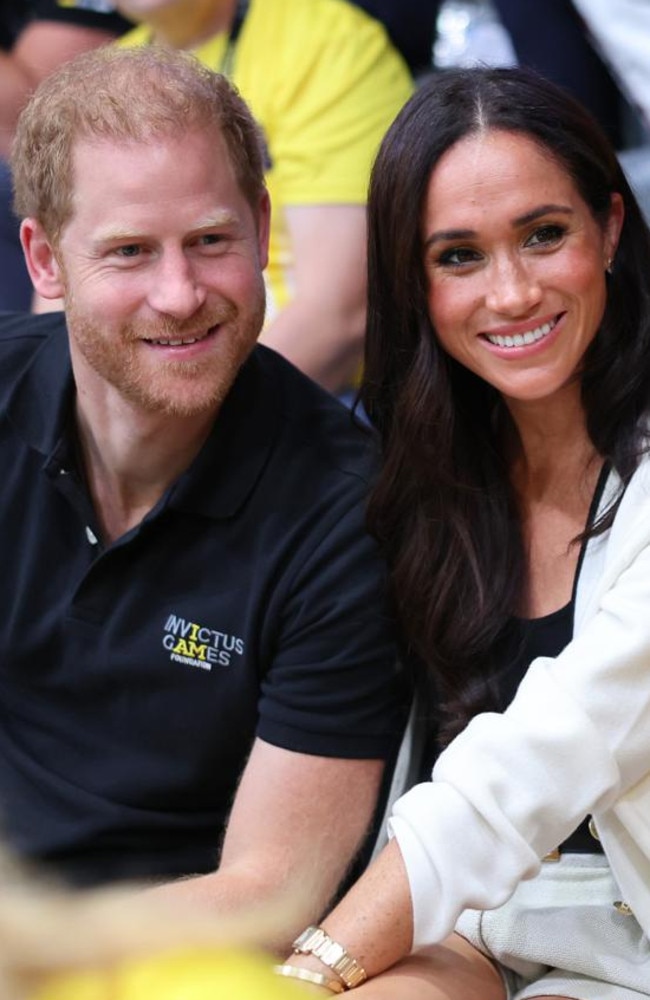 Prince Harry, Duke of Sussex and Meghan, Duchess of Sussex attend the Wheelchair Basketball preliminary match between Ukraine and Australia during the Invictus Games Dusseldorf 2023 in Germany. Picture: Getty Images/Invictus Games Foundation