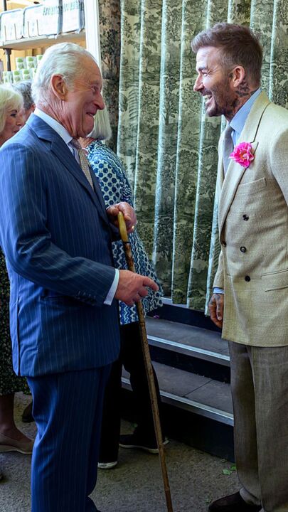 Becks and King Charles share a laugh at flower show
