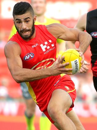 Adam Saad trade: Essendon lands Gold Coast defender for second-round ...