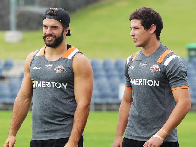 James Tedesco and Mitchell Moses during a Tigers training session.