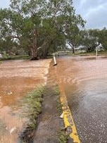 The Todd River in Alice Springs is flowing after heavy rainfall across the Territory. Picture: Sue Martin