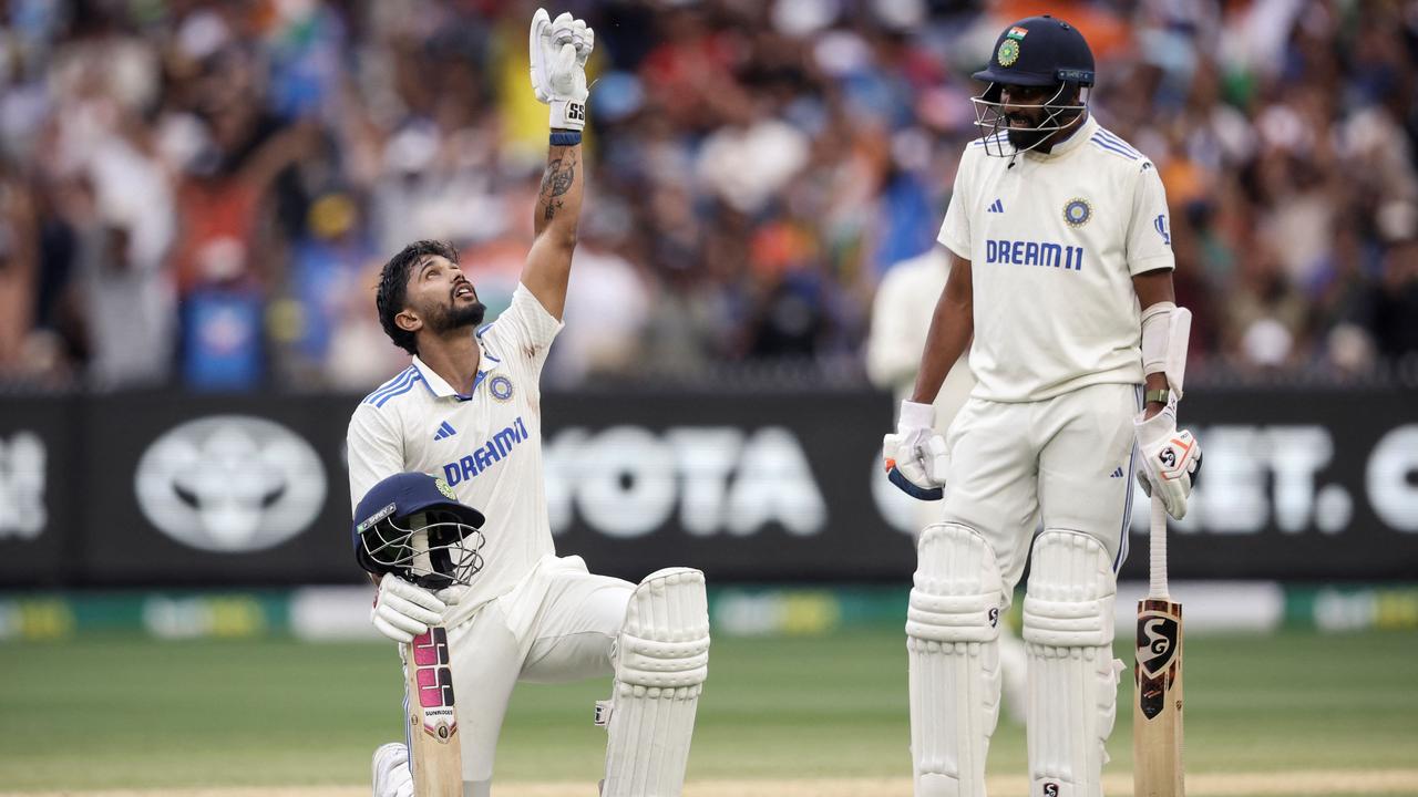 India's Nitish Kumar Reddy celebrates after scoring his maiden test century. Picture: Martin Keep/AFP