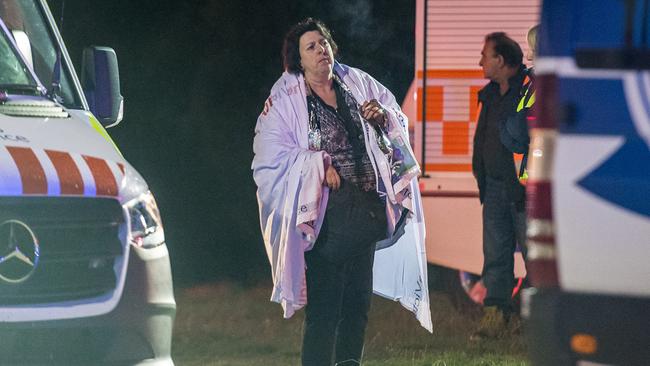 Injured passengers were treated at a makeshift triage station near the Hume Highway. Picture: Jake Nowakowski