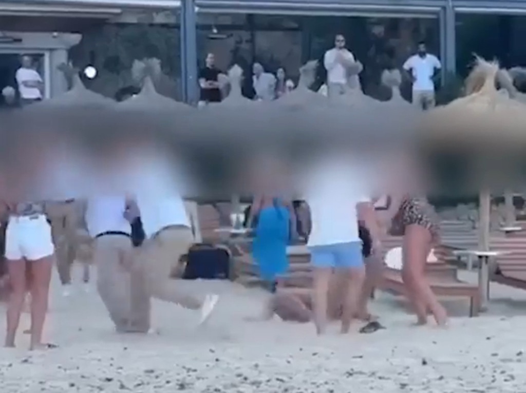 The moment the brawl broke out on the beach. Picture: Solarpix