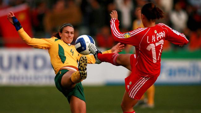 The Matildas’ Dianne Alagich battles for possession with China AFC’s Lina Pan during the Women’s Asian Cup at Hindmarsh Stadium in 2006. Picture: Matt Turner