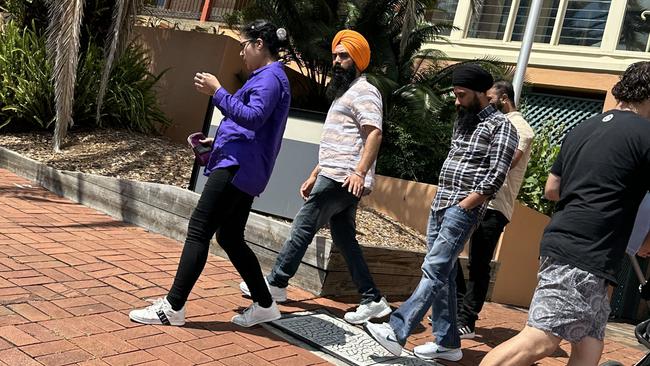 Lovepreet Singh, (in orange turban) with support leaving Lismore Courthouse. He was convicted and sentenced to an 18 month community correction order after the crash death of Lindendale farmer and grandfather Peter Johnston in January 2022.