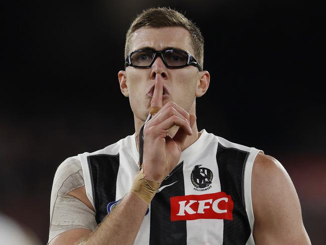 MELBOURNE , AUSTRALIA. May 3, 2024.  AFL. Carlton vs Collingwood at the MCG. Shhhh.  Mason Cox of the Magpies gestures towards the crowd after kicking a 2nd qtr goal    . Pic: Michael Klein