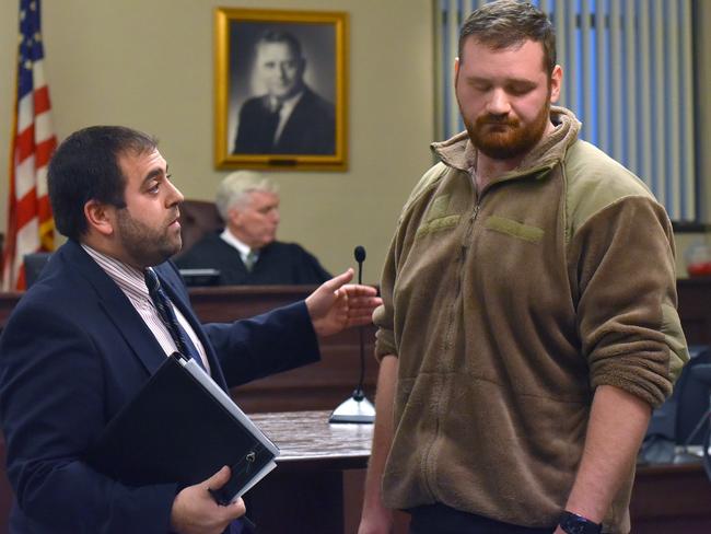 Lawyer Ben Hirshfield, left, stands with his client Joseph Irwin during an indictment hearing. Picture: Mark DiOrio/Observer-Dispatch via AP.