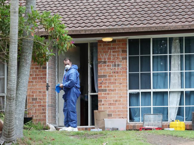 Police forensically investigating the home at Narara where Ms Easey was allegedly murdered. Picture: Sue Graham.