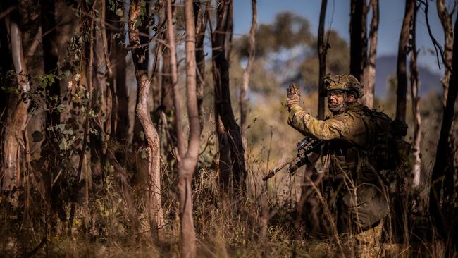 An Australian army soldier from the 3rd Battalion, Royal Australian Regiment, provides target indication during a section attack conducted as part of the 2022 Duke of Gloucester Cup in Singleton. *** Local Caption *** Australian Army infantry soldiers from across Australia tested their core skills for the prestigious Duke of Gloucester Cup at the School of Infantry, near Singleton in NSW, July 31 - August 5 2022. The Duke of Gloucester Cup is the Armyâ€™s premier military skills competition, pitting the best Royal Australian Corps of Infantry rifle sections from each unit against one another through a series of challenging activities that test their core infantry skills, including marksmanship, tactics, teamwork and fitness. Along with the Duke of Gloucester Cup, five other trophies are awarded: Sir Arthur MacDonald Trophy for best foundation war-fighting skills; Gurkha Trophy for best live-fire shooting; Royal Ulster Rifles Trophy for best falling plate shooting; OSCMAR Trophy for best battle endurance; and the DSM Roche CSC Memorial Cup for best individual soldier. The Duke of Gloucester Cup was created by Prince Henry, Duke of Gloucester, in 1946, while serving as the Governor-General of Australia.