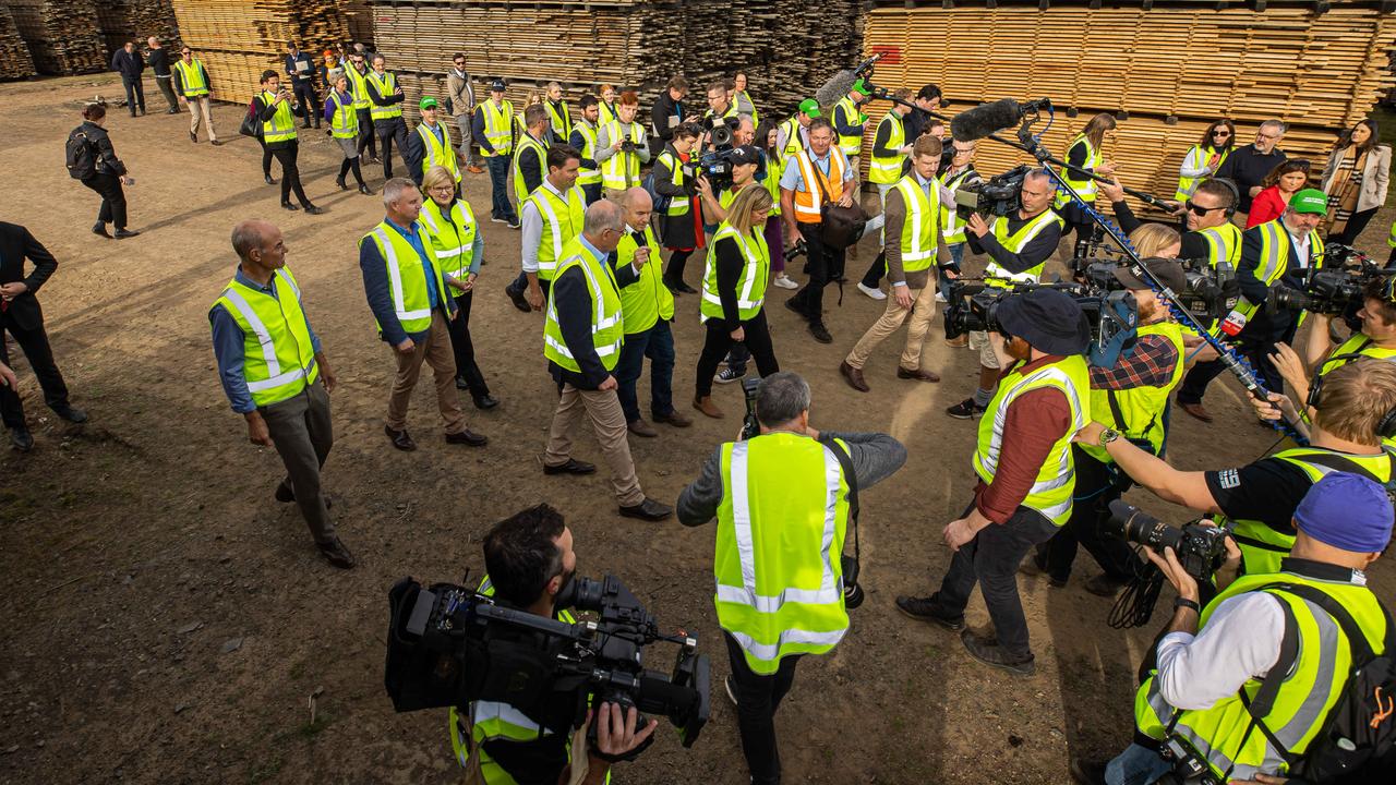 Prime Minister Scott Morrison - with the press pack - visits Neville Smith Forest Products in Tasmania. Picture: Jason Edwards