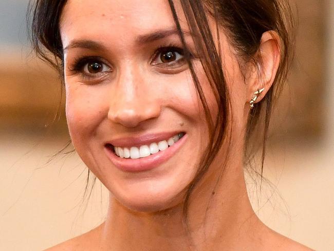 CARDIFF, WALES - JANUARY 18:  Meghan Markle chats with people inside the Drawing Room during a visit to Cardiff Castle on January 18, 2018 in Cardiff, Wales. (Photo by Ben Birchall - WPA Pool / Getty Images)