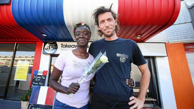 French couple Damien Pigot and Sandy Mendy outside their 3 Sea Cafe in happier times. Picture: Scott Powick