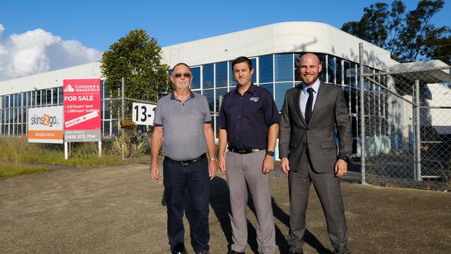 Scorpio Screens &amp; Blinds founder Cameron Wood, manager Dyson Wood and Josh Wright, of Cushman &amp; Wakefield, outside of 13-17 Demand Ave, Arundel.