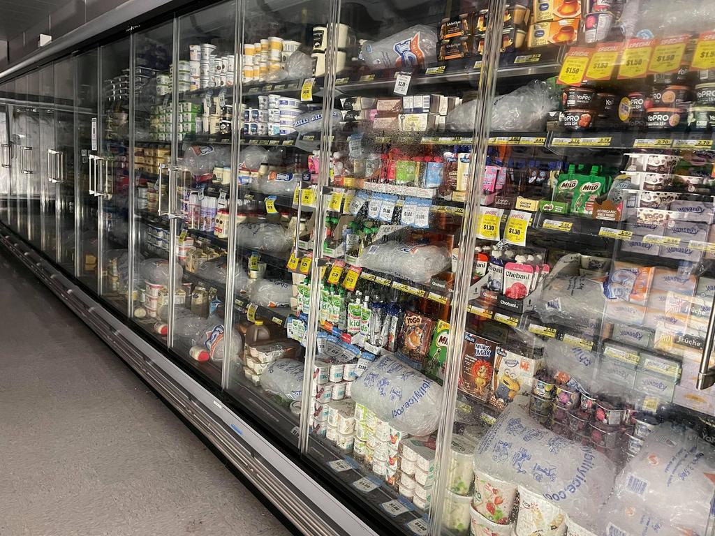 Ice was used to chill products at Romsey IGA had to after wild storms cut power. Picture: Zoe Phillips