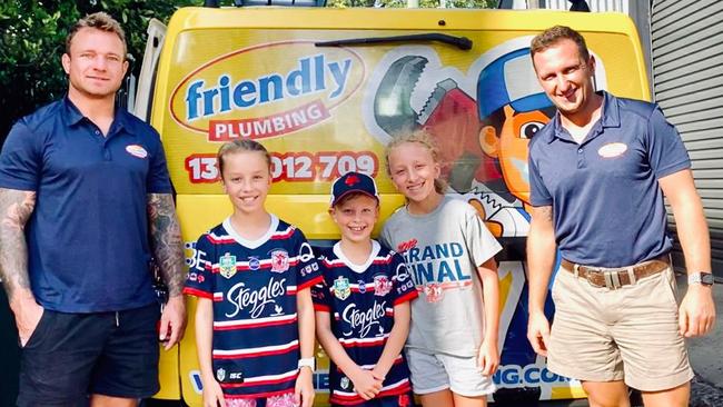 Roosters NRL hooker Jake Friend and young helpers as he starts a new business while training as a plumber.