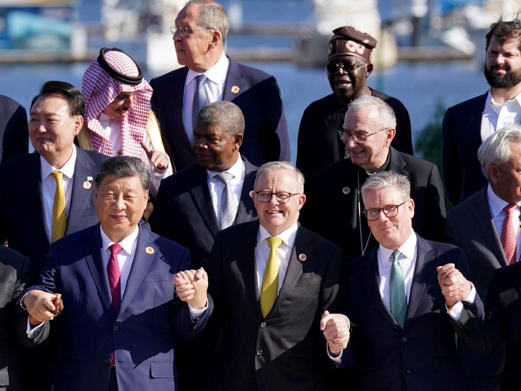 RIO DE JANEIRO, BRAZIL - NOVEMBER 18: (L-R front row) Chinese Prime Minister Xi Jinping, Australian Prime Minister Anthony Albanese, UK Prime Minister Sir Keir Starmer and Colombian President Gustavo Petro with leaders of the G20 members as they pose for the photo of the Global Alliance Against Hunger and Poverty at the G20 summit at the Museum of Modern Art on November 18, 2024 in Rio de Janeiro, Brazil. Keir Starmer is attending his first G20 Summit since he was elected Prime Minister of the UK. He is expected to hold talks with President Xi Jinping of China, the first time a UK PM has done so for six years. (Photo by Stefan Rousseau - WPA Pool/Getty Images)