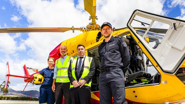 Intensive Care Flight Paramedic Emily Byers, Minister Guy Barnett, Regional General Manager at Westpac Justin Caccavo and Senior Constable Lee Warrington with the Westpac helicopter at Hobart Airport after securing a new funding agreement. Picture: Linda Higginson