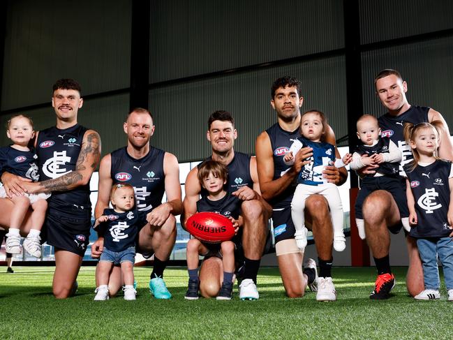 PLEASE CREDIT: AFL PHOTOS Group Photo - Zac Williams (with daughter Ayla), Sam Docherty (with daughter Ruby), George Hewett (with son Henry), Jack Martin (with daughter Rosie), Mitch McGovern (with son Hamish and daughter Margot) MELBOURNE, AUSTRALIA - FEBRUARY 07: during the 2024 Carlton Blues Official Team Photo Day at Ikon Park on February 07, 2024 in Melbourne, Australia. (Photo by Dylan Burns/AFL Photos)