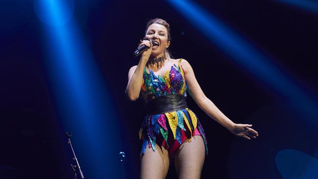 Singer Dannii Minogue took to the stage in a rainbow-coloured Wonder Woman dress.