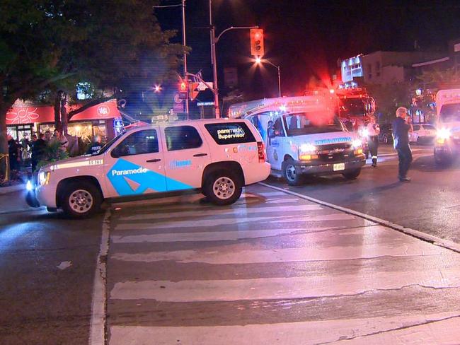 Police and emergency services arrive at the scene of a shooting on Danforth Avenue, Toronto. Picture: Supplied/ Twitter