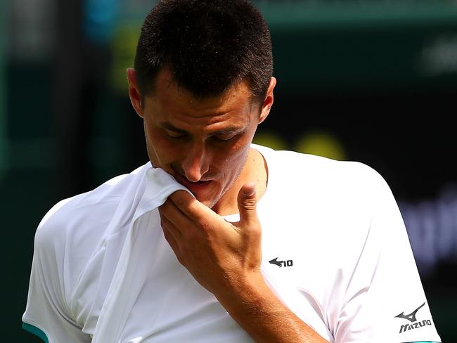 LONDON, ENGLAND - JULY 02: Bernard Tomic of Australia reacts in his Men's Singles first round match against Jo-Wilfred Tsonga of France during Day two of The Championships - Wimbledon 2019 at All England Lawn Tennis and Croquet Club on July 02, 2019 in London, England. (Photo by Clive Brunskill/Getty Images)