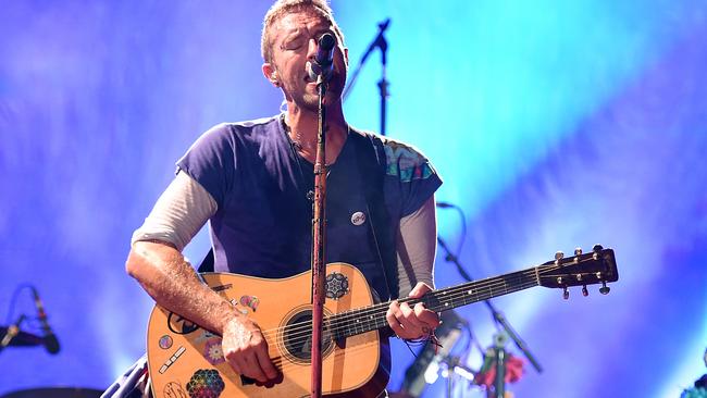 Chris Martin, lead singer of British rock band Coldplay, performs at Suncorp Stadium in Brisbane.