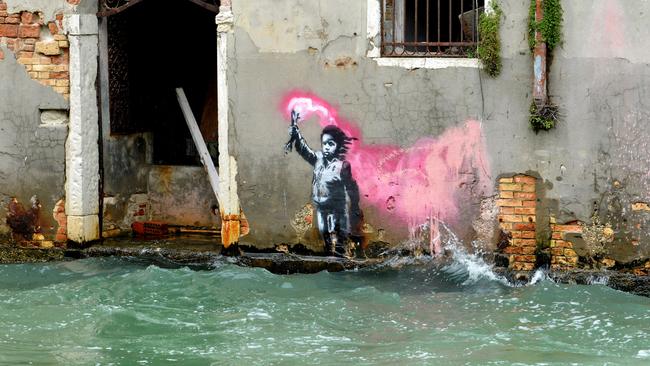 The work by British street artist Banksy that has Italians at odds. Picture: AFP