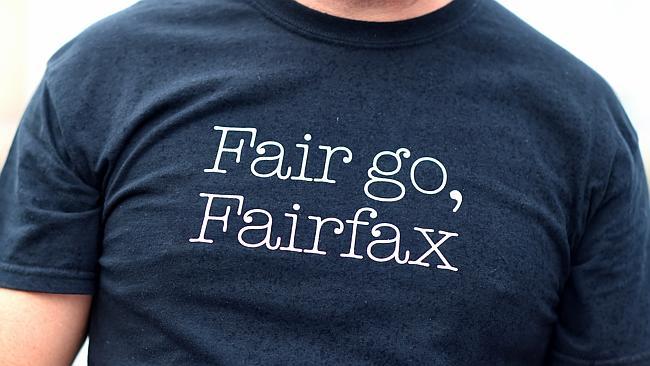 A Fairfax employee wears a t-shirt with the slogan 'Fair go, Fairfax' during a protest against job cuts announced by Fairfax outside Parliament House in Canberra, Friday, March 18, 2016. The company yesterday announced 120 editorial positions would be cut, and in response staff voted to walk off the job until Monday. (AAP Image/Lukas Coch) NO ARCHIVING