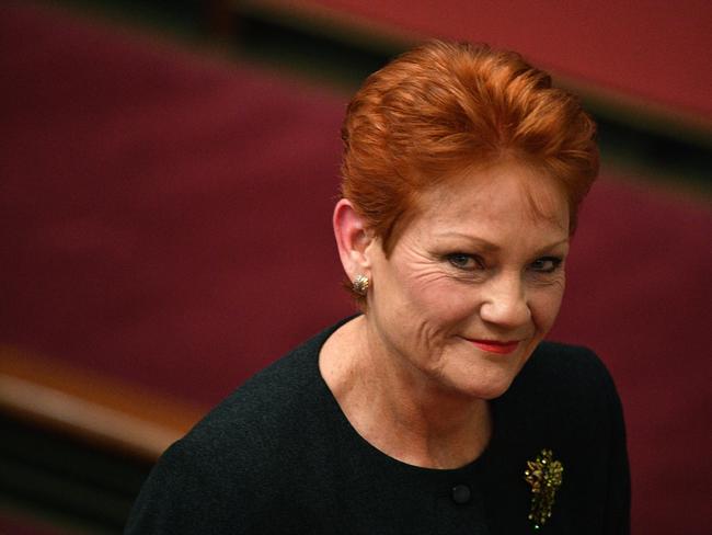 One Nation leader Senator Pauline Hanson leaves after speaking on the government's personal tax cuts in the Senate chamber at Parliament House in Canberra, Wednesday, June 20, 2018. (AAP Image/Mick Tsikas) NO ARCHIVING