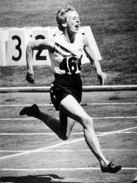 Betty Cuthbert hits the line to win 400 metre gold at the 1964 Tokyo Olympics