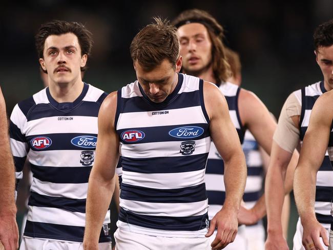 ADELAIDE, AUSTRALIA - AUGUST 27: Tom Hawkins and his Cats team mates look dejected as they walk from the ground at half time during the AFL Second Qualifying Final match between Port Adelaide Power and Geelong Cats at Adelaide Oval on August 27, 2021 in Adelaide, Australia. (Photo by Daniel Kalisz/Getty Images)