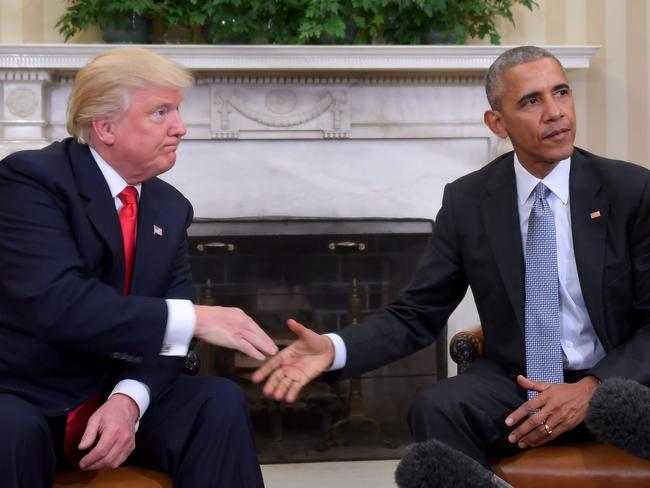 US President Barack Obama shakes hands as he meets with Republican President-elect Donald Trump in the Oval Office. Picture: AFP PHOTO / JIM WATSON